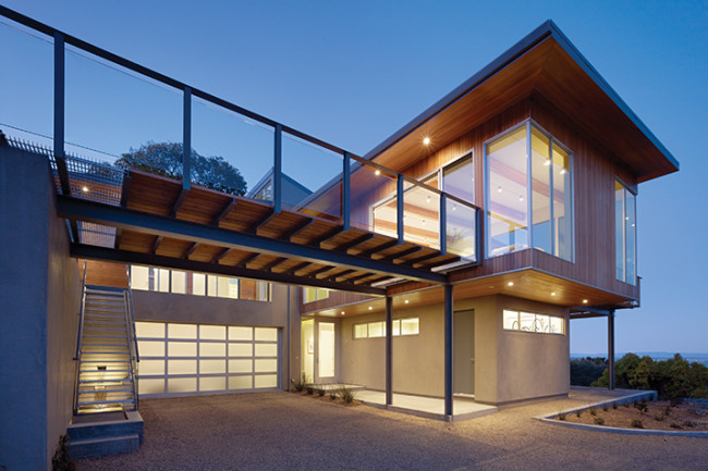 modern home with glass garage door