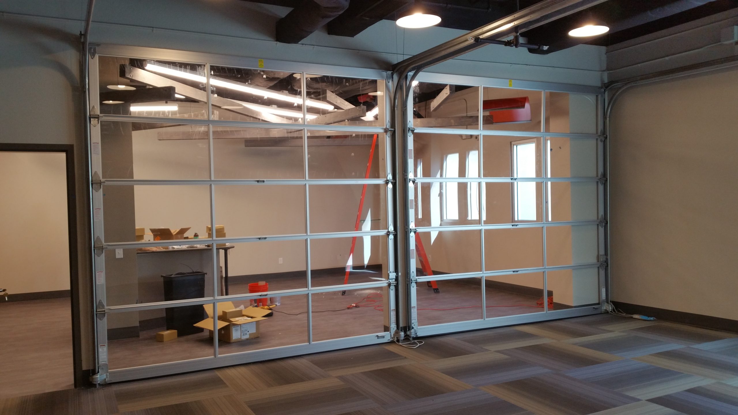 Why Choose Full-View Glass Garage Doors for Modern Interior Spaces?