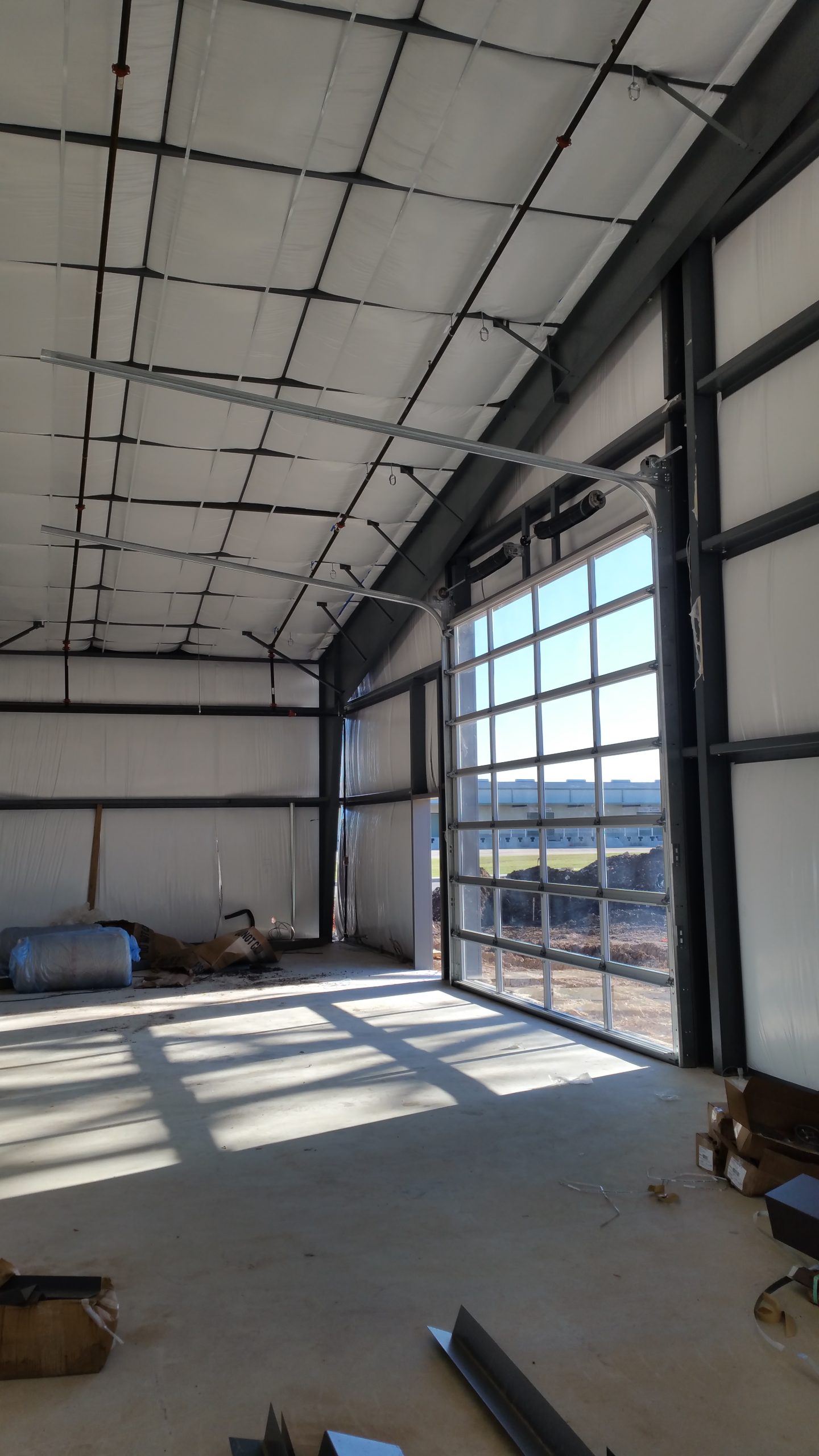Exploring Full-View Glass Garage Doors: Installation & Benefits for Commercial Spaces